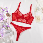 Zweiteiliges Set aus gepunktetem, ultradünnem, durchsichtigem BH und String aus Mesh.